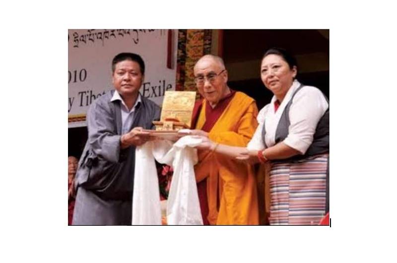 Dolma Gyari believed to stand with Penpa Tsering