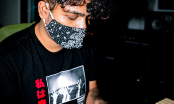 ep’s life was about to change as he agreed to exchange his favourite, Bombay Rockers, album for his school friend’s 50 Cent’s. His first listen of ‘In Da Club’ and Rajdeep knew he had seen the lord in the face of hip-hop. It was after a few years of exploring the genre, the artists and after flirting with beats and texts that Rajdeep Sinha was reborn as Stunnah Beatz. This critically and internationally lauded juggernaut, born and raised in Shillong and Guwhati, wrote his own verses and raps at 17 and took to his prodigious production talents when he found himself unsatiated with the trap/hip-hop riffs and beats available on the music-market and he has never looked back since. He first gained mainstream limelight when he won Beatstars' Best Remix award for Tabletops by Murs along with fellow producer Sez On The Beat, where they vanquished international artists who were making it big at that time. It was shortly after this win that Stunnah’s astronomical production talent, his cosmic, cyclopean creativity and consistency met Sez On The Beat, with whom he completes the internationally acclaimed hip-hop/trap production duo known as Stunnah Sez Beatz. In his revolutionary style, his devotion, his experimentations, and R&Ds he gave a new face to hip-hop in India and jazzed up the existing definitions of trap as known by the nation. Signed by Divine’s entrepreneurial venture Gully Gang that is a mammothian, all-encompassing entity for India’s hip-hop talent, Stunnah has also made a name for himself in international grounds. With his incredible roster of records which are always on rotation in most rap fans' playlists, he is credited with being the creative powerhouse behind some of the biggest homegrown hip-hop tracks, and his production credits have recurringly entailed artists like PNB Rock, SI, L2B Gang, Chip, Naezy, Ard Adz, DAX, YBN Almighty and many others. It’s exhilarating and can easily give anyone the chills, how Stunnah went from being under the heavy influence of artists like Eminem and Lil Wayne to producing beats for international artists signed under Def Jam, Atlantic, etc. The latest, gilded feather to his hip-hop cap, though, is how Stunnah was an executive producer for Divine’s new album Punya Paap and of tracks like 3:59 AM. The album debuted number 1 on Spotify India and moved on to become an overall gangbuster. Well known artists from The USA and The UK like Nas and Dutchavelli were in on the album too which clearly made Stunnah a hip-hop sensation along with the best go-to creative magnífic for music production in the country.