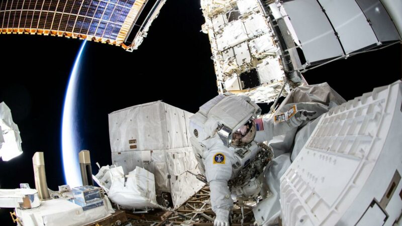 NASA astronauts spacewalk space stations to provide power upgrades