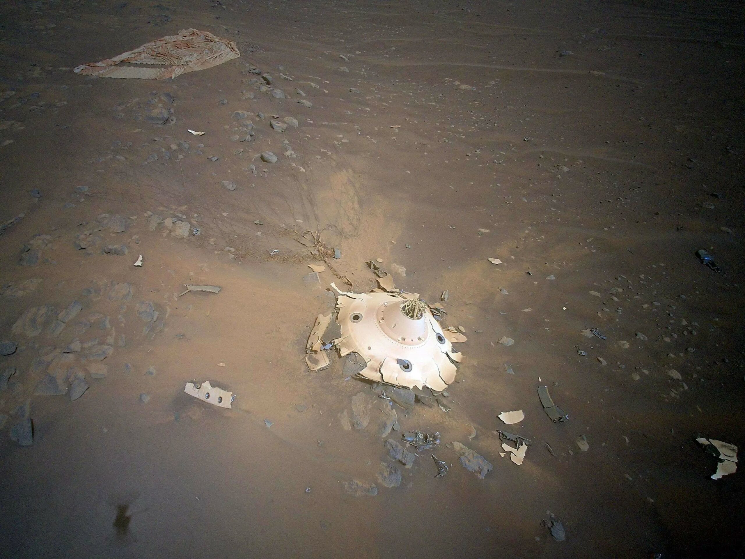 A NASA helicopter photographed the remains of a rover that landed on Mars. This is another example of how humans are polluting the other world.