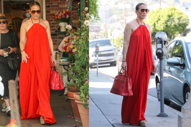 In a matching Hermes Birkin bag and a red maxi dress, Jennifer Lopez looks effortless