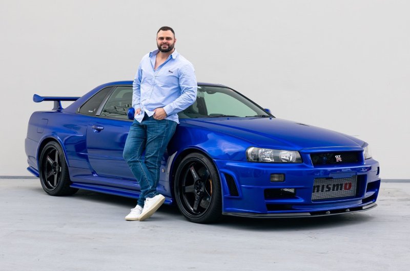 Unveiling the Automotive Marvel: Lecha Khouri’s 1 of 1 R34 GTR NISMO F-Sport Wangan Blue Anniversary Supercar!